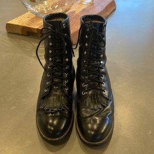 Womens black Justin Ropers style 506 labeled size 7 wide.